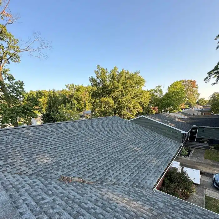 Aerial view of a newly installed shingle roof, illustrating the variety of roofing materials Cherry Hill professionals use for high-quality results.